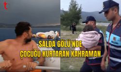 SALDA GÖLÜ'NDE ÇOCUĞU KURTARAN KAHRAMAN