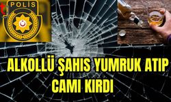 Alkollü şahıs yumruk atıp camı kırdı