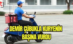 Demir çubukla kuryenin başına vurdu