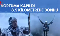 Hortuma kapılarak 8.5 kilometre yükseğe çıkan paraşütçü dondu