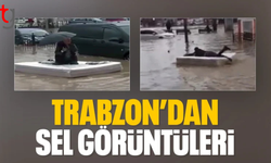 Trabzon'da sel sonrası göle dönen yolda yatakla gezdi