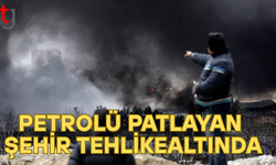 İran’da vurulan petrol deposu gökyüzünü siyah dumana boğdu